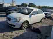 2011 Hyundai Accent GLS with VIN KMHCN4AC0BU596779, listed as a Copart auction lot 74252774 with 198,696 mi miles and Salvage title. Bid and sale history available at DreamBid. Image 1.