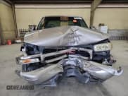 ✅ 1999 GMC Sierra 1500 SLE • VIN: 1GTEK19T7XZ520785 • Лот: 67946695. Опубликован ранее на Copart с пробегом 306 015 миль. Бесплатный доступ к архиву аукционных продаж из США и подробный отчёт об истории автомобиля на DreamBid. Изображение 5.