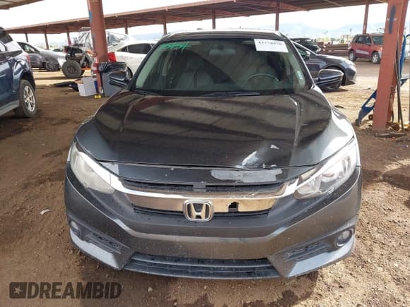 ✅ 2018 Honda Civic EX-T • VIN: JHMFC1F35JX021667 • Lot: 43778970. Listed on IAAI with 159,063 mi. Free auction sales archive from the USA and detailed vehicle history report at DreamBid. Image 12.