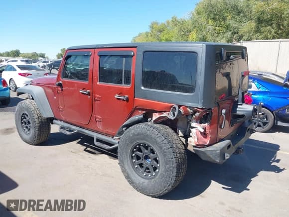 ✅ 2014 Jeep Wrangler Unlimited Rubicon • VIN: 1C4HJWFG3EL210802 • Lot: 43295800. Listed on IAAI with 117,719 mi. Free auction sales archive from the USA and detailed vehicle history report at DreamBid. Image 3.