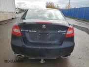 ✅ 2012 Suzuki Kizashi SE • VIN: JS2RF9A32C6100580 • Лот: 91204895. Опубликован ранее на Copart с пробегом 173 714 миль. Бесплатный доступ к архиву аукционных продаж из США и подробный отчёт об истории автомобиля на DreamBid. Изображение 6.