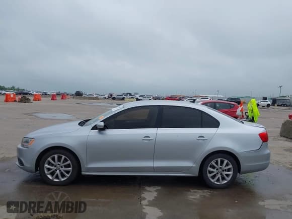 ✅ 2013 Volkswagen Jetta SE • VIN: 3VWDX7AJXDM373706 • Lot: 42161655. Listed on IAAI with 202,471 mi. Free auction sales archive from the USA and detailed vehicle history report at DreamBid. Image 14.