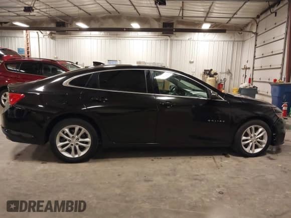 2018 Chevrolet Malibu LT z VIN 1G1ZD5ST4JF263938, wystawiony jako IAAI lot #43378625 z przebiegiem 90 540 mil mil oraz . Historia ofert i sprzedaży dostępna na DreamBid. Obrazek 13.