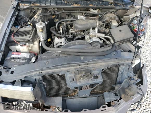 1999 Chevrolet S-10 LS с VIN 1GCCS19X7XK189242, выставлен на аукционе Copart как лот 77129404 с пробегом 208 281 миль миль и Списание • Salvage title. История ставок и продаж доступна на DreamBid. Изображение 13.