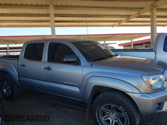 ✅ 2014 Toyota Tacoma PreRunner • VIN: 3TMJU4GN1EM173354 • Лот: 43372469. Опубликован ранее на IAAI с пробегом 103 127 миль. Бесплатный доступ к архиву аукционных продаж из США и подробный отчёт об истории автомобиля на DreamBid. Изображение 13.