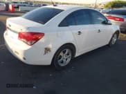 ✅ 2014 Chevrolet Cruze 1LT • VIN: 1G1PC5SB6E7299339 • Lot: 43680374. Listed on IAAI with 98,677 mi. Free auction sales archive from the USA and detailed vehicle history report at DreamBid. Image 4.