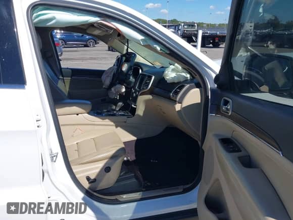 2016 Jeep Grand Cherokee Limited with VIN 1C4RJFBG1GC335021, listed as a IAAI auction lot 43250632 with 115,217 mi miles and . Bid and sale history available at DreamBid. Image 5.