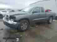 2005 Dodge Dakota SLT with VIN 1D7HE42N65S189095, listed as a Copart auction lot 78869074 with 121,993 mi miles and Salvage title. Bid and sale history available at DreamBid. Image 1.