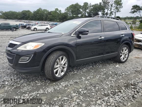 ✅ 2012 Mazda CX-9 Grand Touring • VIN: JM3TB2DA5C0335580 • Lot: 70488795. Wystawiony na Copart z przebiegiem 161 553 mil. Bezpłatny archiwum sprzedaży aukcyjnych z USA i szczegółowy raport historii pojazdu na DreamBid. Zdjęcie 1.