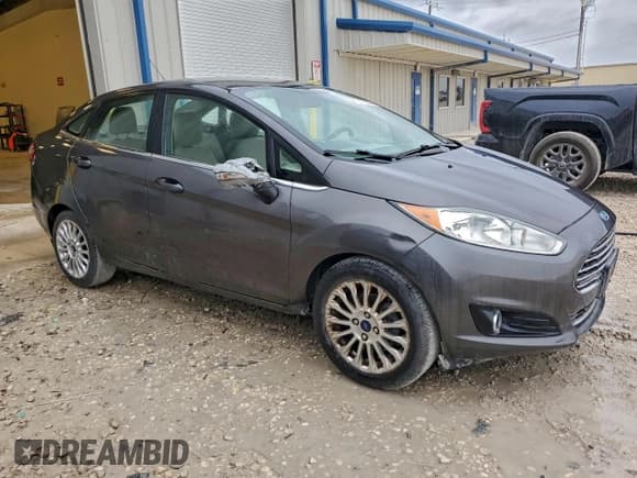 ✅ 2015 Ford Fiesta Titanium • VIN: 3FADP4CJ4FM110781 • Lot: 91611685. Wystawiony na Copart z przebiegiem 108 612 mil. Bezpłatny archiwum sprzedaży aukcyjnych z USA i szczegółowy raport historii pojazdu na DreamBid. Zdjęcie 4.