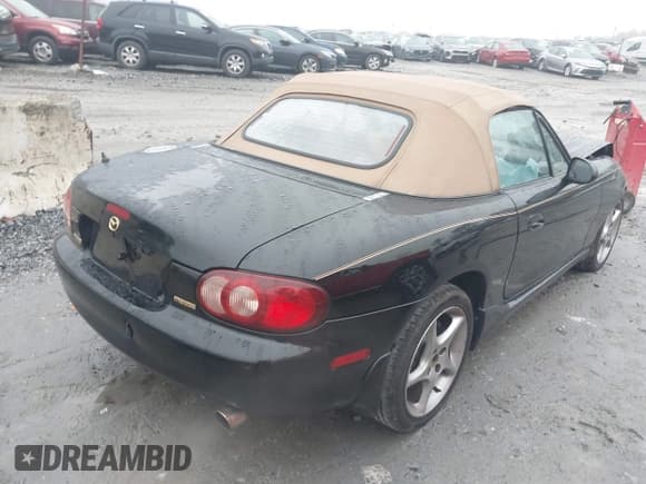 ✅ 2002 Mazda MX-5 Miata Cloth • VIN: JM1NB353120221906 • Lot: 43868481. Listed on IAAI with 99,471 mi. Free auction sales archive from the USA and detailed vehicle history report at DreamBid. Image 4.