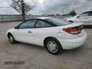 ✅ 1997 Saturn SC • VIN: 1G8ZF1282VZ133256 • Лот: 74026354. Опубликован ранее на Copart с пробегом 84 564 миль. Бесплатный доступ к архиву аукционных продаж из США и подробный отчёт об истории автомобиля на DreamBid. Изображение 2.
