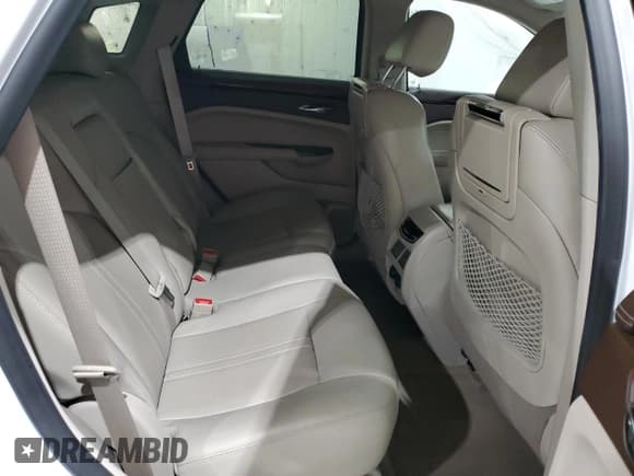 ✅ 2013 Cadillac SRX Premium Collection • VIN: 3GYFNJE32DS571017 • Лот: 90260825. Опубликован ранее на Copart с пробегом 135 219 миль. Бесплатный доступ к архиву аукционных продаж из США и подробный отчёт об истории автомобиля на DreamBid. Изображение 11.