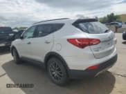 ✅ 2013 Hyundai Santa Fe Sport • VIN: 5XYZUDLA1DG014870 • Лот: 59911754. Опубликован ранее на Copart с пробегом 318 004 миль. Бесплатный доступ к архиву аукционных продаж из США и подробный отчёт об истории автомобиля на DreamBid. Изображение 2.