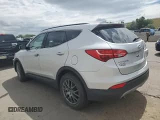 ✅ 2013 Hyundai Santa Fe Sport • VIN: 5XYZUDLA1DG014870 • Лот: 59911754. Опубликован ранее на Copart с пробегом 318 004 миль. Бесплатный доступ к архиву аукционных продаж из США и подробный отчёт об истории автомобиля на DreamBid. Изображение 2.