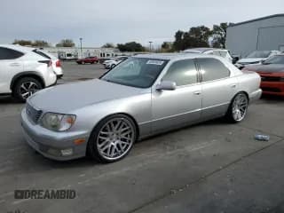 ✅ 1999 Lexus LS 400 • VIN: JT8BH28F8X0160674 • Лот: 80935024. Опубликован ранее на Copart с пробегом 279 241 миль. Бесплатный доступ к архиву аукционных продаж из США и подробный отчёт об истории автомобиля на DreamBid. Изображение 1.