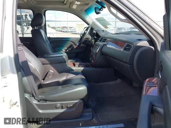 2013 Chevrolet Tahoe LTZ with VIN 1GNSCCE09DR357731, listed as a IAAI auction lot 43343449 with 148,667 mi miles and . Bid and sale history available at DreamBid. Image 5.