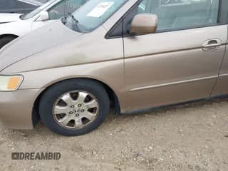 ✅ 2003 Honda Odyssey EX-L • VIN: 5FNRL18013B006498 • Lot: 43570227. Wystawiony na IAAI z przebiegiem 244 528 mil. Bezpłatny archiwum sprzedaży aukcyjnych z USA i szczegółowy raport historii pojazdu na DreamBid. Zdjęcie 6.