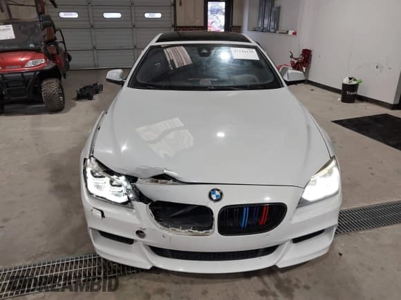 ✅ 2014 BMW 6 Series 650i • VIN: WBA6B2C58ED129009 • Lot: 43546135. Listed on IAAI with 123,509 mi. Free auction sales archive from the USA and detailed vehicle history report at DreamBid. Image 12.