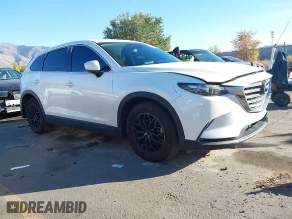 ✅ 2016 Mazda CX-9 Touring • VIN: JM3TCACY9G0108355 • Lot: 43570385. Listed on IAAI with 132,041 mi. Free auction sales archive from the USA and detailed vehicle history report at DreamBid. Image 1.
