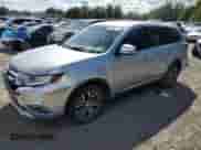 2018 Mitsubishi Outlander SE with VIN JA4AD3A34JJ002083, listed as a Copart auction lot 87060775 with 176,219 mi miles and Clean title. Bid and sale history available at DreamBid. Image 1.