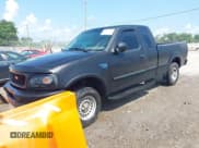 ✅ 1998 Ford F-150 • VIN: 1FTRX18L2WKA67414 • Lot: 42583873. Listed on IAAI with 189,546 mi. Free auction sales archive from the USA and detailed vehicle history report at DreamBid. Image 2.