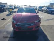 ✅ 2016 Ford Fusion Titanium • VIN: 3FA6P0SU0GR123335 • Lot: 43664496. Listed on IAAI with 105,830 mi. Free auction sales archive from the USA and detailed vehicle history report at DreamBid. Image 13.