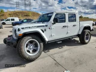 ✅ 2022 Jeep Gladiator Rubicon • VIN: 1C6JJTBG1NL151892 • Lot: 81916765. Wystawiony na Copart z przebiegiem 24 915 mil. Bezpłatny archiwum sprzedaży aukcyjnych z USA i szczegółowy raport historii pojazdu na DreamBid. Zdjęcie 1.