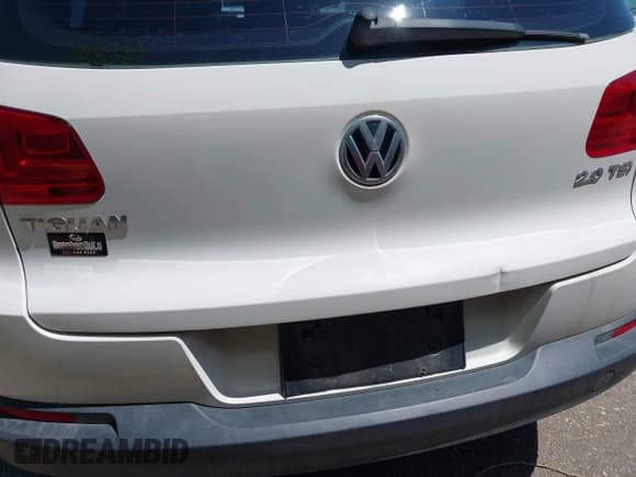 ✅ 2013 Volkswagen Tiguan S • VIN: WVGAV3AX8DW581359 • Лот: 42232568. Опубликован ранее на IAAI с пробегом 124 141 миль. Бесплатный доступ к архиву аукционных продаж из США и подробный отчёт об истории автомобиля на DreamBid. Изображение 6.