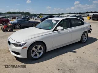 ✅ 2013 BMW 3 Series 320i • VIN: WBA3B1C5XDK129567 • Lot: 69114445. Listed on Copart with 98,744 mi. Free auction sales archive from the USA and detailed vehicle history report at DreamBid. Image 1.