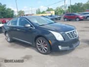 ✅ 2013 Cadillac XTS Luxury • VIN: 2G61P5S33D9156889 • Lot: 42447238. Listed on IAAI with 135,144 mi. Free auction sales archive from the USA and detailed vehicle history report at DreamBid. Image 1.