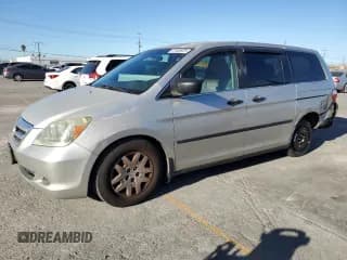 ✅ 2007 Honda Odyssey LX • VIN: 5FNRL38267B048104 • Lot: 87488925. Listed on Copart with 117,119 mi. Free auction sales archive from the USA and detailed vehicle history report at DreamBid. Image 1.