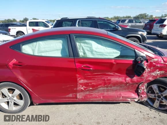 ✅ 2012 Hyundai Elantra GLS • VIN: KMHDH4AE3CU445997 • Лот: 43557389. Опубликован ранее на IAAI с пробегом 141 103 миль. Бесплатный доступ к архиву аукционных продаж из США и подробный отчёт об истории автомобиля на DreamBid. Изображение 14.