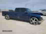 2002 Chevrolet Silverado 1500 with VIN 1GCEC19T72E170006, listed as a Copart auction lot 48615565 with 361,904 mi miles and Salvage title. Bid and sale history available at DreamBid. Image 4.