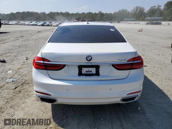 ✅ 2017 BMW 7 Series 740i • VIN: WBA7E2C5XHG739931 • Lot: 81453395. Listed on Copart with 121,438 mi. Free auction sales archive from the USA and detailed vehicle history report at DreamBid. Image 6.