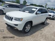 ✅ 2015 Jeep Grand Cherokee • VIN: 1C4RJEJM8FC674648 • Lot: 42785823. Listed on IAAI with 207,084 mi. Free auction sales archive from the USA and detailed vehicle history report at DreamBid. Image 2.