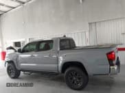 ✅ 2021 Toyota Tacoma SR5 • VIN: 5TFAZ5CN9MX115532 • Lot: 43208018. Listed on IAAI with 25,144 mi. Free auction sales archive from the USA and detailed vehicle history report at DreamBid. Image 14.