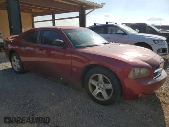 2009 Dodge Charger SXT with VIN 2B3KA33V49H601520, listed as a Copart auction lot 68101594 with 198,802 mi miles and Salvage title. Bid and sale history available at DreamBid. Image 4.