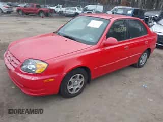 2005 Hyundai Accent GLS z VIN KMHCG45CX5U614083, wystawiony jako IAAI lot #41006582 z przebiegiem 72 516 mil mil oraz . Historia ofert i sprzedaży dostępna na DreamBid. Obrazek 2.