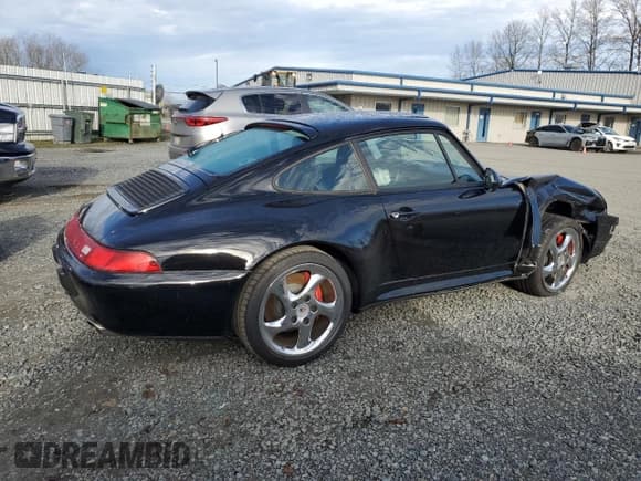 ✅ 1997 Porsche 911 • VIN: WP0AA2990VS320557 • Lot: 49679545. Listed on Copart with 21,380 mi. Free auction sales archive from the USA and detailed vehicle history report at DreamBid. Image 3.