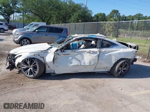 ✅ 2022 Infiniti Q60 Luxe • VIN: JN1EV7KLXNM630151 • Лот: 41962288. Опубликован ранее на IAAI с пробегом Не указан. Бесплатный доступ к архиву аукционных продаж из США и подробный отчёт об истории автомобиля на DreamBid. Изображение 13.