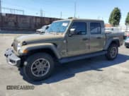 ✅ 2020 Jeep Gladiator Overland • VIN: 1C6HJTFG3LL166089 • Lot: 82164505. Listed on Copart with 52,841 mi. Free auction sales archive from the USA and detailed vehicle history report at DreamBid. Image 1.