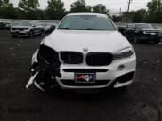 ✅ 2016 BMW X6 xDrive50i • VIN: 5UXKU6C53G0R34315 • Lot: 64052075. Listed on Copart with 104,800 mi. Free auction sales archive from the USA and detailed vehicle history report at DreamBid. Image 14.