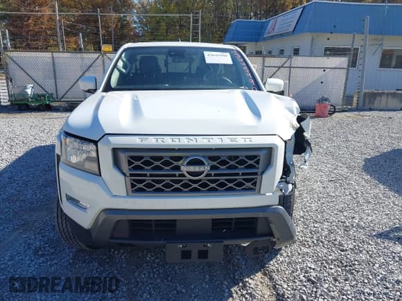 ✅ 2023 Nissan Frontier S • VIN: 1N6ED1CM5PN634140 • Lot: 43645990. Listed on IAAI with 31,135 mi. Free auction sales archive from the USA and detailed vehicle history report at DreamBid. Image 12.