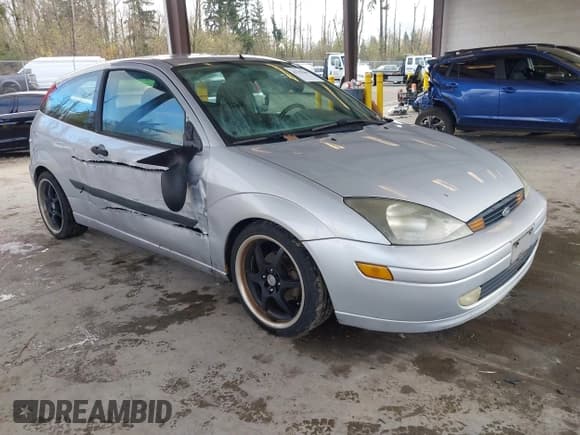 ✅ 2003 Ford Focus ZX3 • VIN: 3FAFP31Z53R143511 • Lot: 43782068. Listed on IAAI with Not provided. Free auction sales archive from the USA and detailed vehicle history report at DreamBid. Image 1.
