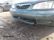 ✅ 1999 Mazda 626 ES • VIN: 1YVGF22C0X5835930 • Лот: 41666820. Опубликован ранее на IAAI с пробегом 93 973 миль. Бесплатный доступ к архиву аукционных продаж из США и подробный отчёт об истории автомобиля на DreamBid. Изображение 12.