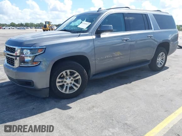✅ 2020 Chevrolet Suburban LT • VIN: 1GNSCHKC4LR302047 • Lot: 42518927. Listed on IAAI with 105,760 mi. Free auction sales archive from the USA and detailed vehicle history report at DreamBid. Image 17.
