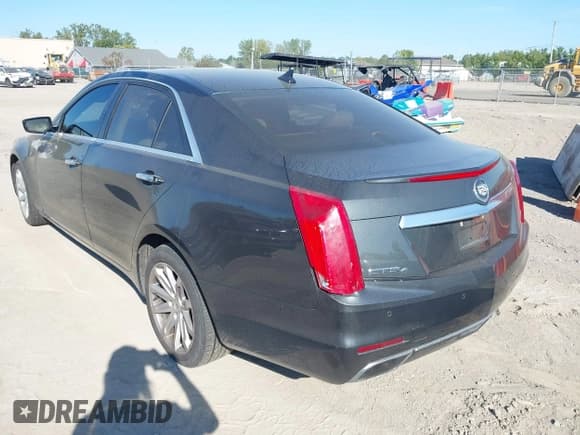 ✅ 2014 Cadillac CTS Luxury AWD • VIN: 1G6AX5SX9E0129517 • Лот: 43102344. Опубликован ранее на IAAI с пробегом 140 691 миль. Бесплатный доступ к архиву аукционных продаж из США и подробный отчёт об истории автомобиля на DreamBid. Изображение 3.