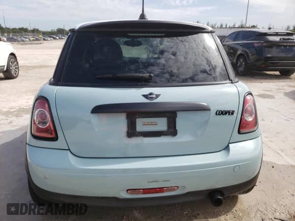 2012 MINI Hardtop with VIN WMWSU3C52CT367682, listed as a Copart auction lot 63045965 with 124,683 mi miles and Salvage title. Bid and sale history available at DreamBid. Image 6.