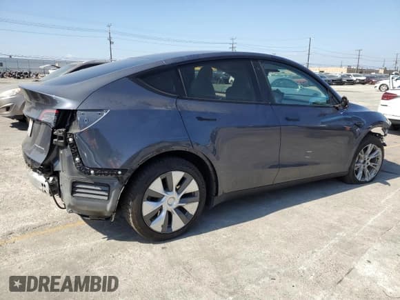 ✅ 2023 Tesla Model Y Long Range • VIN: 7SAYGDEEXPA119664 • Lot: 81953525. Wystawiony na Copart z przebiegiem 71 995 mil. Bezpłatny archiwum sprzedaży aukcyjnych z USA i szczegółowy raport historii pojazdu na DreamBid. Zdjęcie 3.